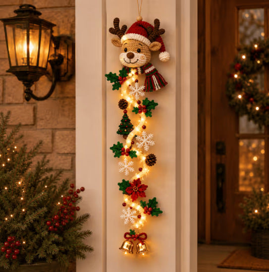Velmerry Glowing Christmas Door Hanger, Reindeer character, illuminated at a front door